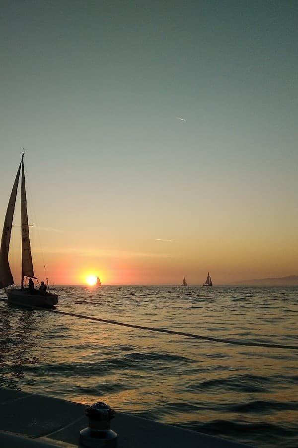 A Fairwind boat sailing into the sunset